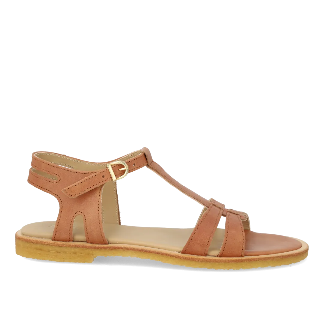 Feminine sandal with strap design