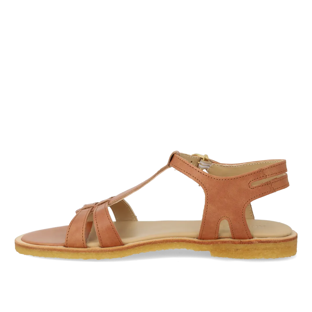 Feminine sandal with strap design