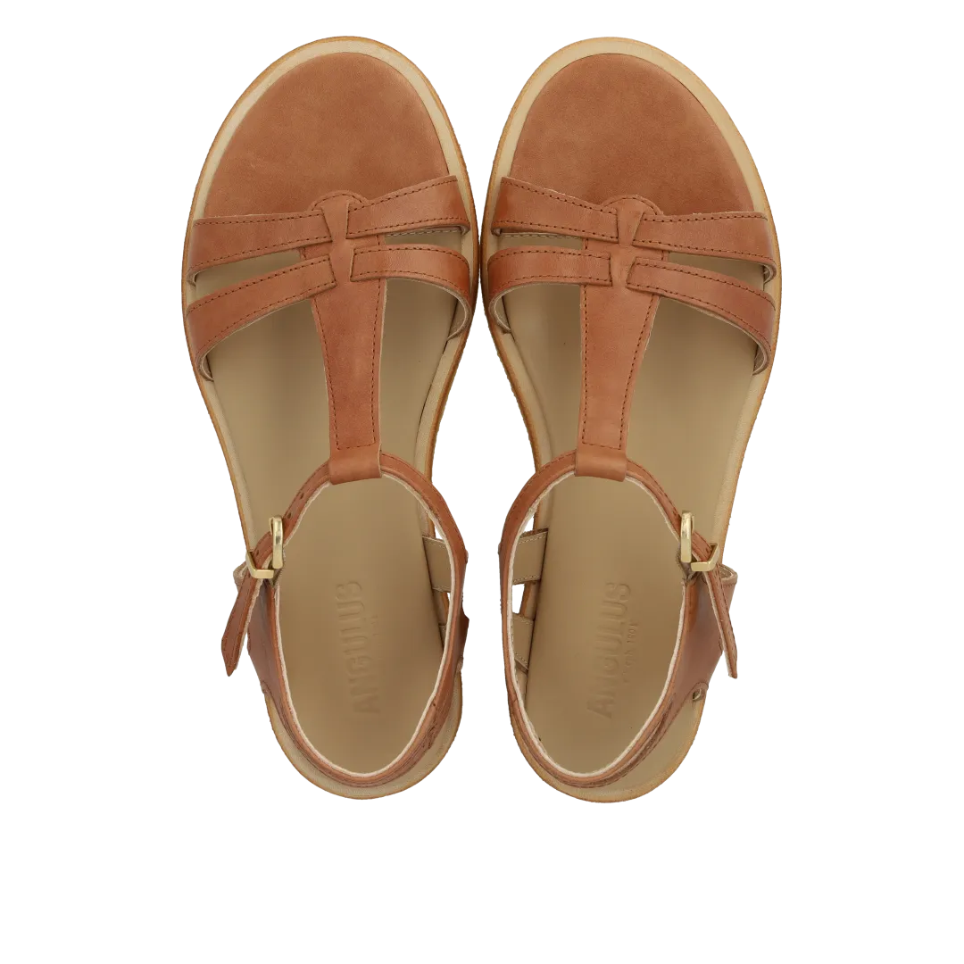 Feminine sandal with strap design